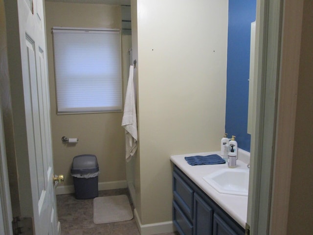 6005 Saint Joseph Ave, Stevensville, MI 49127 - bathroom with vanity and baseboards