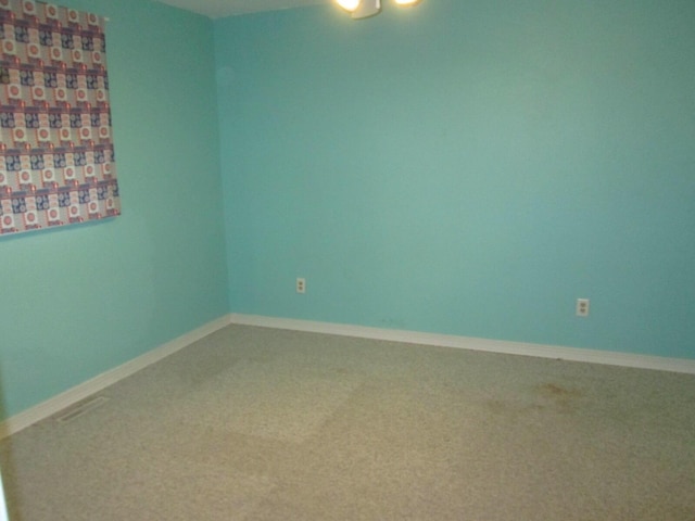 6005 Saint Joseph Ave, Stevensville, MI 49127 - carpeted empty room featuring baseboards