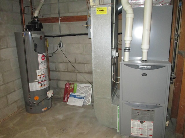 6005 Saint Joseph Ave, Stevensville, MI 49127 - utility room with water heater and heating unit