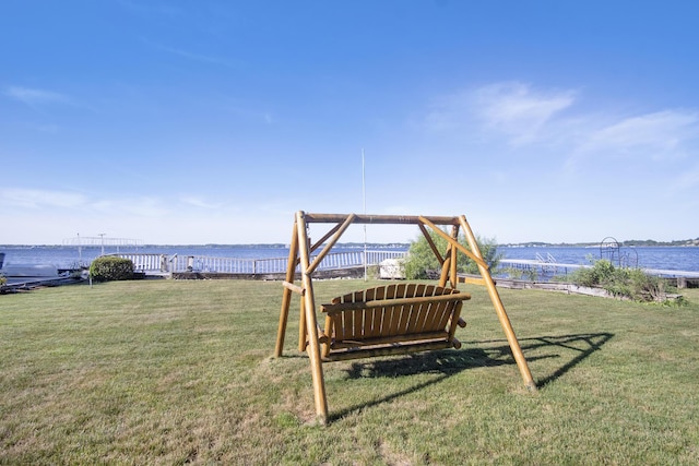 2585 Memorial Dr, Muskegon, MI 49445 - view of grassy yard with a water view
