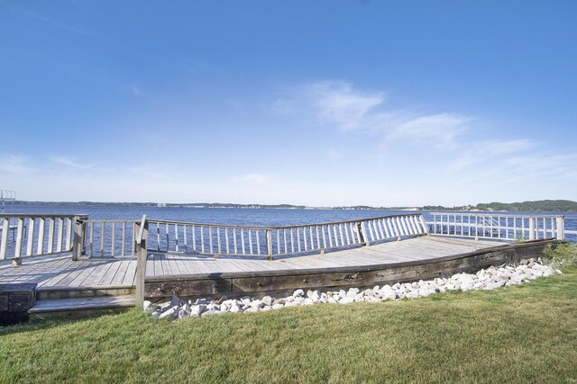 2585 Memorial Dr, Muskegon, MI 49445 - dock area with a yard and a deck with water view