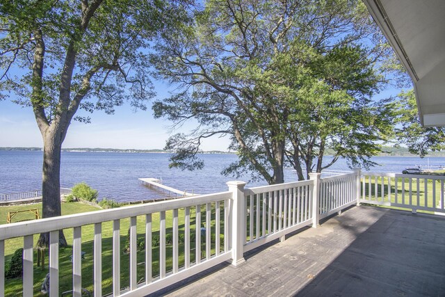 2585 Memorial Dr, Muskegon, MI 49445 - wooden terrace featuring a water view and a boat dock
