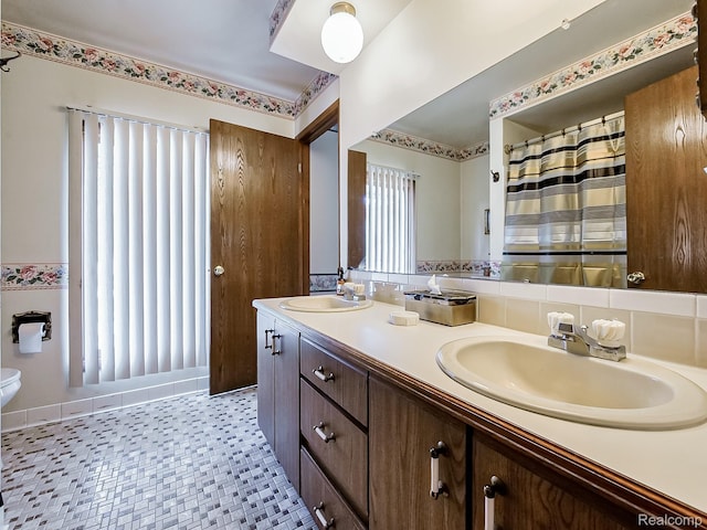 3849 Barg Dr, Warren, MI 48310 - bathroom featuring double vanity and toilet