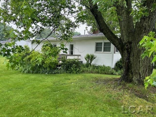 804 W Main St, Morenci, MI 49286 - view of property exterior with a yard