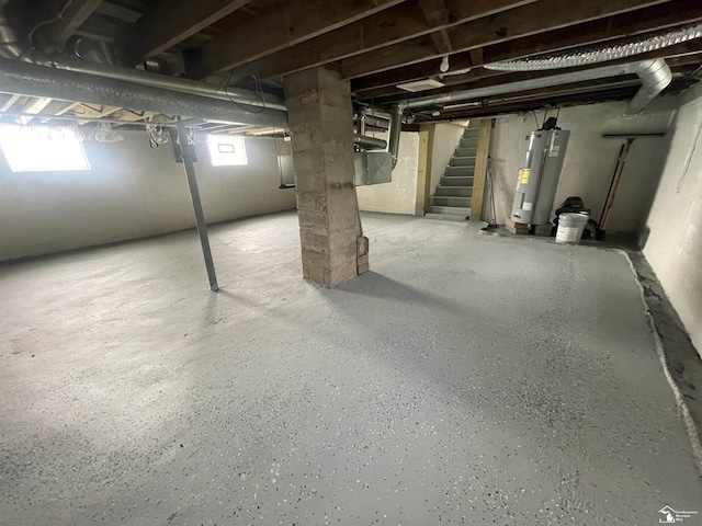 6301 E Albain Rd, Monroe, MI 48161 - below grade area with electric water heater and stairway