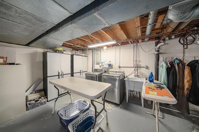 489 Old Creek Ct, Saline, MI 48176 - unfinished below grade area with washer and clothes dryer and a sink