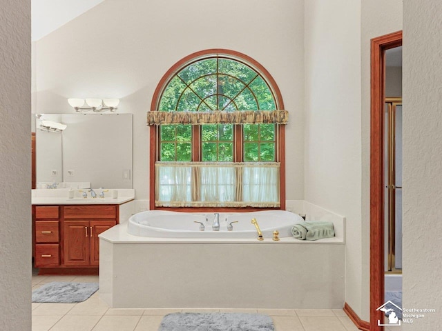 9241 Legacy Ct, Temperance, MI 48182 - bathroom with vanity, a bath, tile patterned floors, and a textured wall