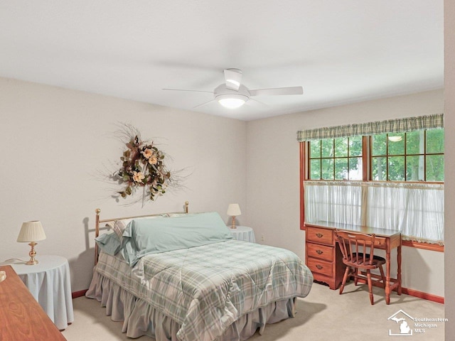 9241 Legacy Ct, Temperance, MI 48182 - carpeted bedroom with a ceiling fan and baseboards