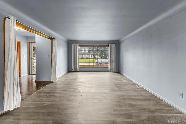 18607 Colonial Ct, Allen Park, MI 48101 - spare room with wood finished floors and baseboards