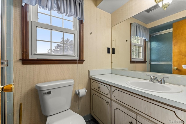 18607 Colonial Ct, Allen Park, MI 48101 - bathroom with vanity, toilet, and a shower with shower door