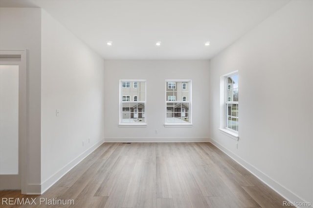 1685 Pinecroft Ln, Howell, MI 48855 - empty room featuring light wood-type flooring, baseboards, and recessed lighting