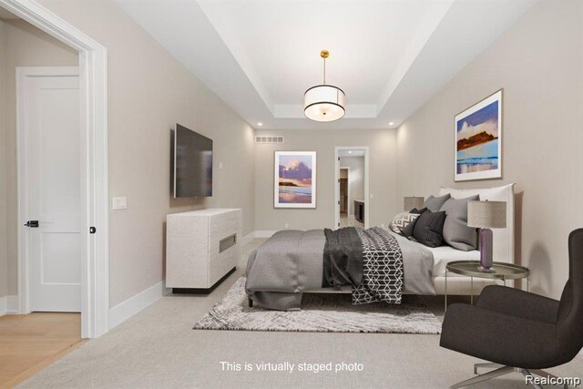 4174 Prescott Park Cir W, Bloomfield, MI 48323 - bedroom featuring baseboards, a tray ceiling, and carpet floors