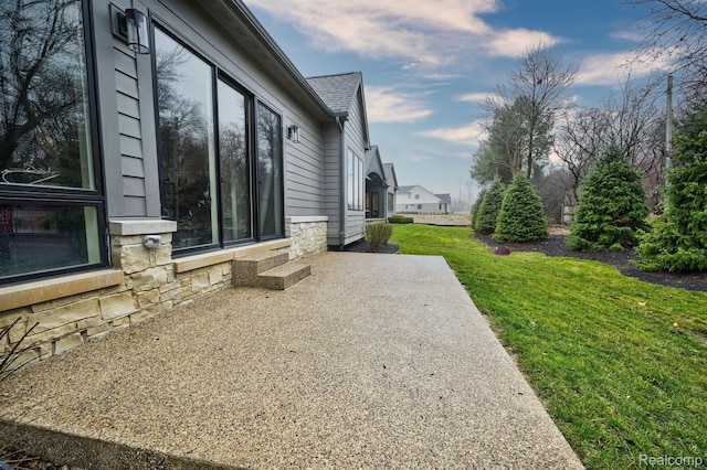 4174 Prescott Park Cir W, Bloomfield, MI 48323 - view of side of home with a patio, a yard, and stone siding