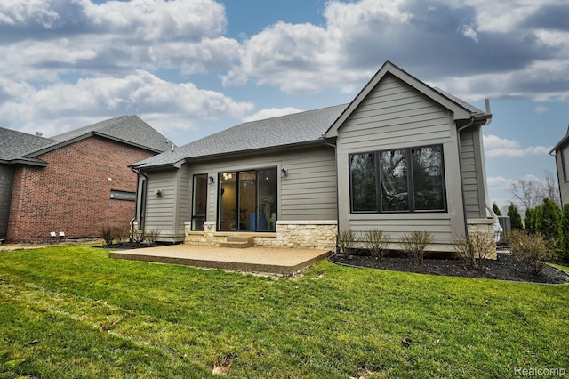 4174 Prescott Park Cir W, Bloomfield, MI 48323 - rear view of property featuring a patio, a lawn, and roof with shingles
