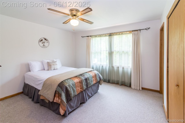 10399 Allen Rd, Clarkston, MI 48348 - bedroom featuring light carpet, baseboards, a ceiling fan, and a closet