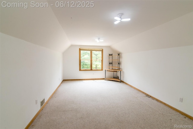 10399 Allen Rd, Clarkston, MI 48348 - bonus room with lofted ceiling, carpet, and baseboards