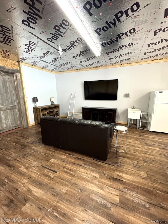 1080 Butcher Rd, Fenton, MI 48430 - living room featuring wood finished floors and baseboards