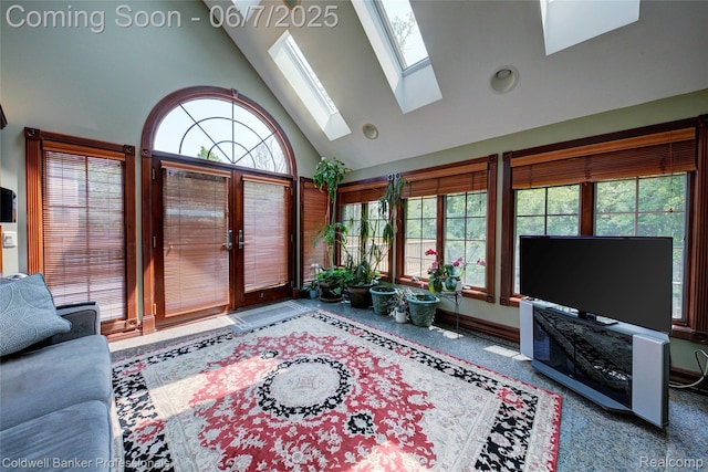4546 Forest Edge Ln, West Bloomfield, MI 48323 - living room featuring high vaulted ceiling, a skylight, french doors, and baseboards