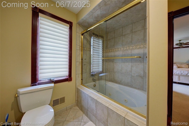 4546 Forest Edge Ln, West Bloomfield, MI 48323 - full bath featuring a combined bath / shower with jetted tub, toilet, tile patterned flooring, baseboards, and ensuite bathroom