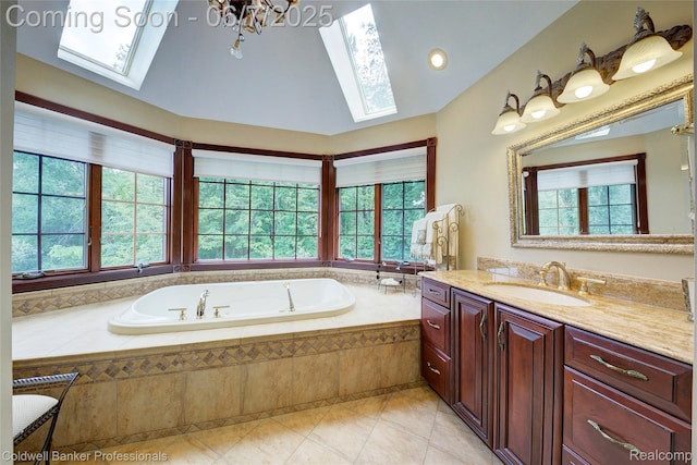 4546 Forest Edge Ln, West Bloomfield, MI 48323 - bathroom featuring a skylight, plenty of natural light, vanity, a bath, and vaulted ceiling
