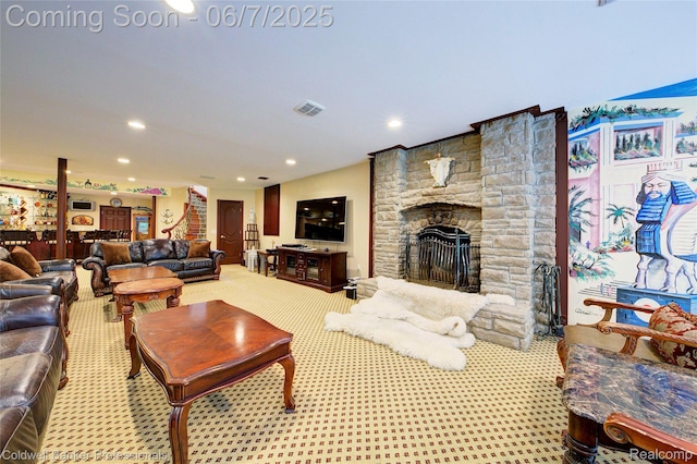 4546 Forest Edge Ln, West Bloomfield, MI 48323 - living room featuring a stone fireplace and recessed lighting