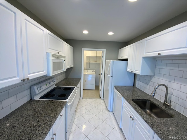 3577 Oakmonte Blvd, Rochester, MI 48306 - kitchen featuring white appliances, washer / clothes dryer, a sink, white cabinetry, and recessed lighting