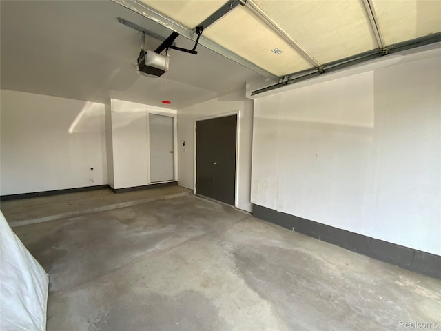 3577 Oakmonte Blvd, Rochester, MI 48306 - garage featuring a garage door opener