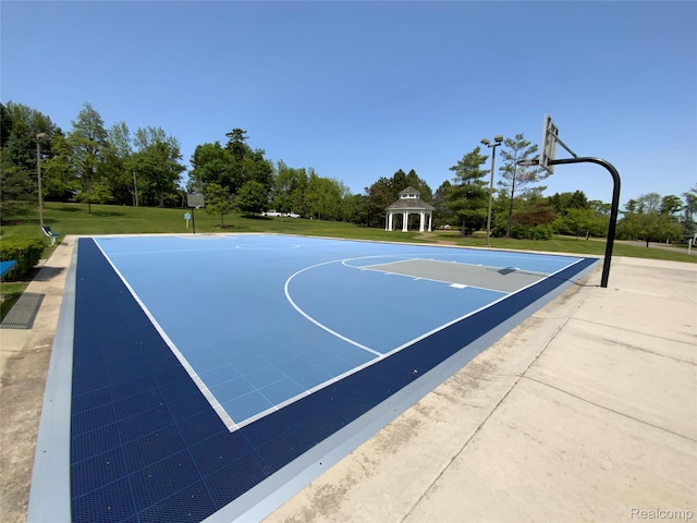 3577 Oakmonte Blvd, Rochester, MI 48306 - view of sport court with a gazebo, a yard, community basketball court, and view of wooded area