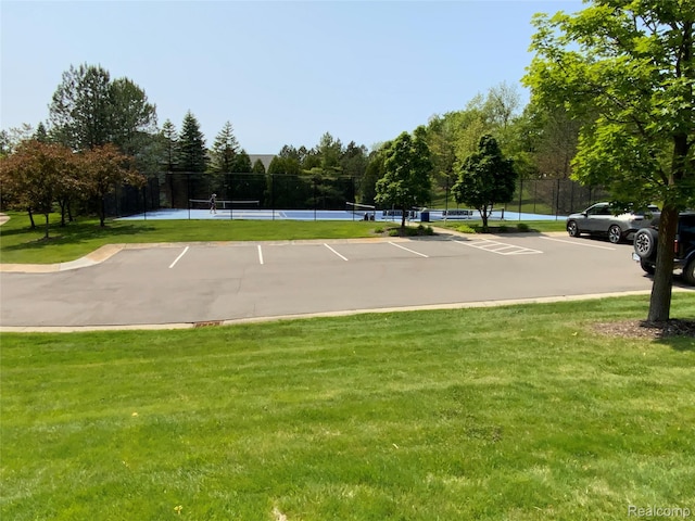 3577 Oakmonte Blvd, Rochester, MI 48306 - uncovered parking lot with a tennis court