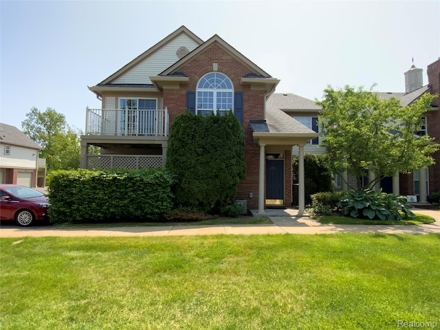 3577 Oakmonte Blvd, Rochester, MI 48306 - view of front of house featuring brick siding and a front lawn