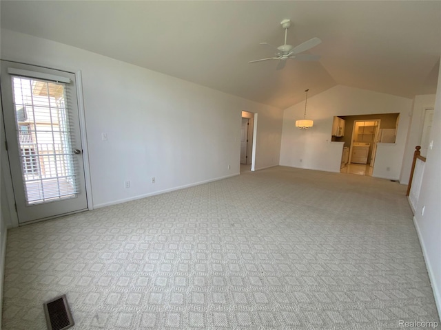 3577 Oakmonte Blvd, Rochester, MI 48306 - unfurnished living room with light carpet, a ceiling fan, lofted ceiling, and baseboards