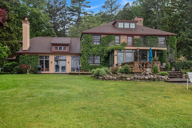 371 Waukazoo Dr, Holland, MI 49424 - rear view of property featuring a chimney, french doors, a yard, and a balcony