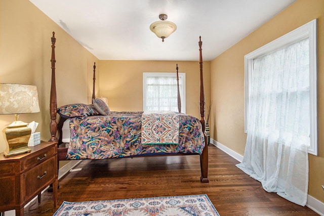 371 Waukazoo Dr, Holland, MI 49424 - bedroom with wood finished floors and baseboards