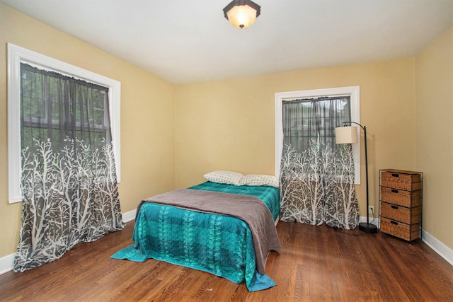 371 Waukazoo Dr, Holland, MI 49424 - bedroom featuring wood finished floors and baseboards