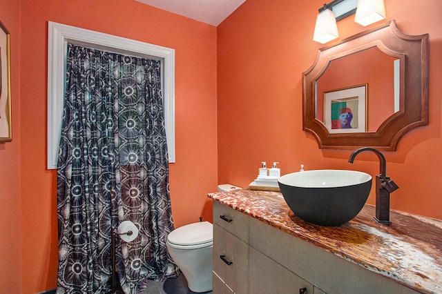 371 Waukazoo Dr, Holland, MI 49424 - bathroom featuring vanity and toilet