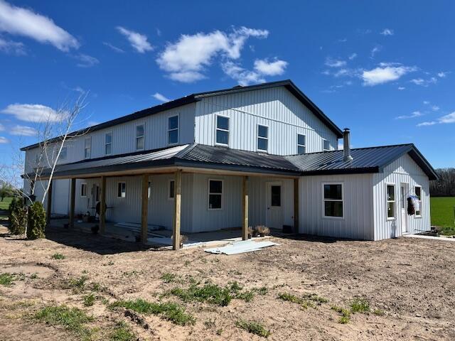 5195 Chief Rd, Brethren, MI 49619 - rear view of property with metal roof