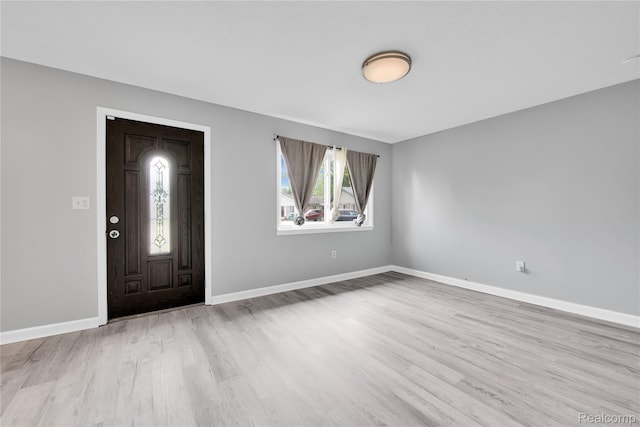 27048 Sally Ct, Taylor, MI 48180 - foyer entrance featuring wood finished floors and baseboards