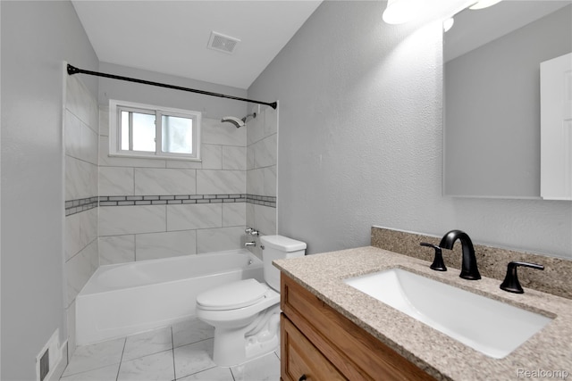 27048 Sally Ct, Taylor, MI 48180 - bathroom featuring vanity, toilet,  shower combination, and marble look tiles
