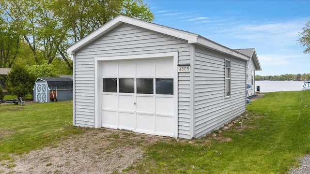 4805 Pinellas Dr, Hale, MI 48739 - detached garage with a water view