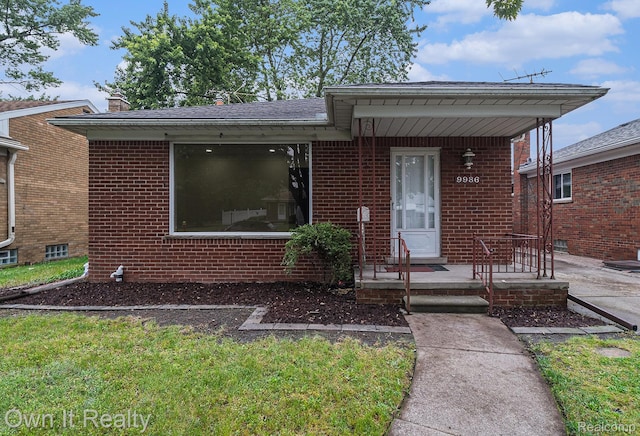 9986 Becker Ave, Allen Park, MI 48101 - bungalow-style home featuring brick siding and a chimney