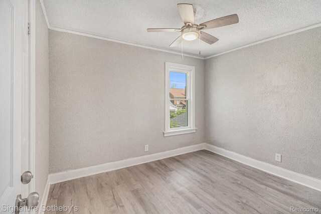 16762 Woodingham Dr, Detroit, MI 48221 - unfurnished room with ornamental molding, light wood-style flooring, a textured ceiling, ceiling fan, and baseboards