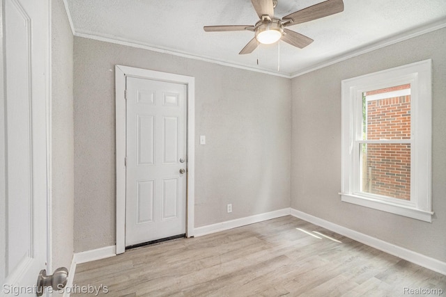 16762 Woodingham Dr, Detroit, MI 48221 - empty room featuring ornamental molding, light wood-style floors, ceiling fan, and baseboards