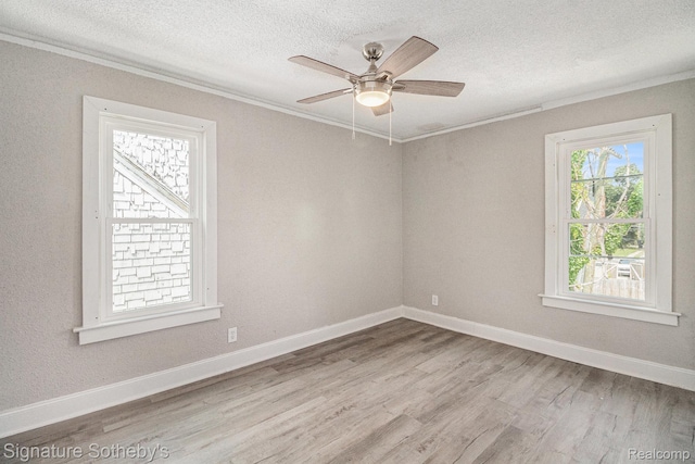 16762 Woodingham Dr, Detroit, MI 48221 - empty room featuring ornamental molding, wood finished floors, a textured ceiling, a ceiling fan, and baseboards