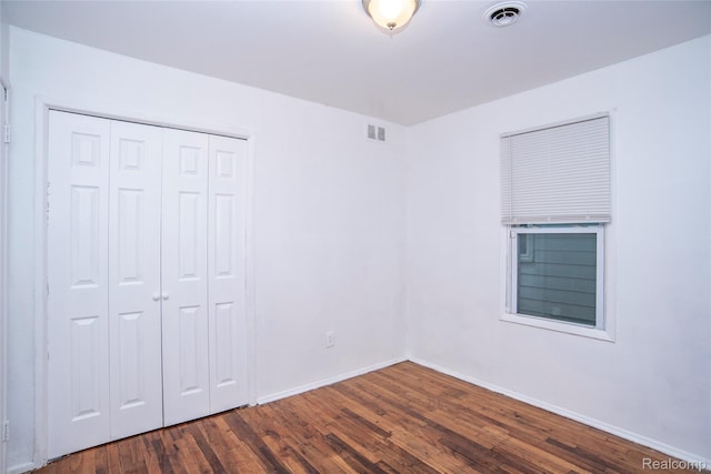 16131 Lenore, Detroit, MI 48219 - unfurnished bedroom with dark wood-type flooring and a closet