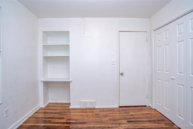 16131 Lenore, Detroit, MI 48219 - unfurnished bedroom featuring wood finished floors and a closet