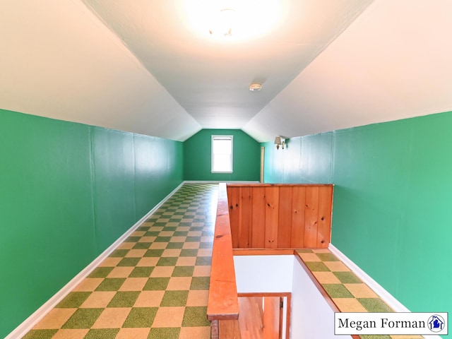 426 Mae-Thy St SE, Grand Rapids, MI 49548 - additional living space with vaulted ceiling and baseboards