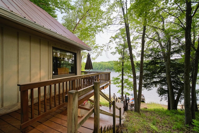 6387 N Larson Rd, Fountain, MI 49410 - wooden terrace with a water view