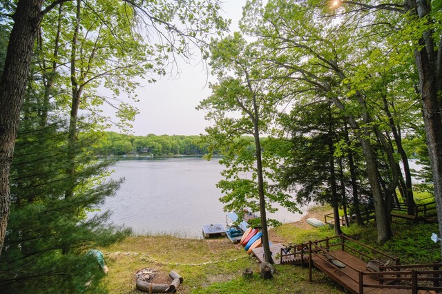 6387 N Larson Rd, Fountain, MI 49410 - water view with a heavily wooded area