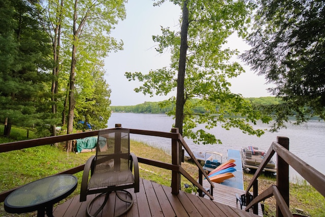 6387 N Larson Rd, Fountain, MI 49410 - wooden terrace with a water view