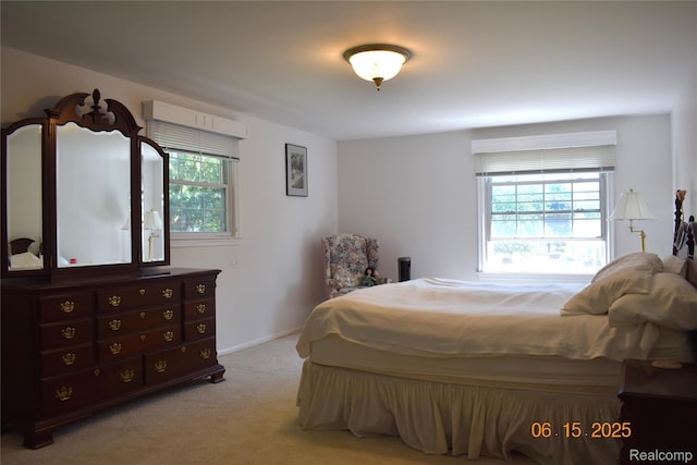 6560 Perham Dr, West Bloomfield, MI 48322 - carpeted bedroom featuring multiple windows
